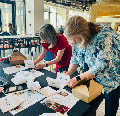 Two women are volunteering with the Hope Lodge Program.